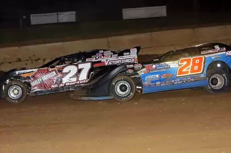 Nick Bartels (27) battles Dennis Erb Jr. (28) at Lincoln Park Speedway. (Jim DenHamer)