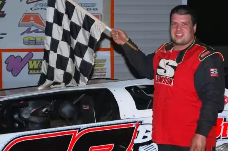 Eric Cooley celebrates his first Super Late Model victory. (photobyconnie.com)