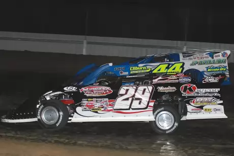 Darrell Lanigan (29) and Clint Smith (44) battle tightly in the late stages. (actiontrackphotos.com)