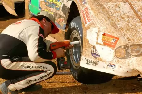 John Gill changes a tire. (dt52photos.com)