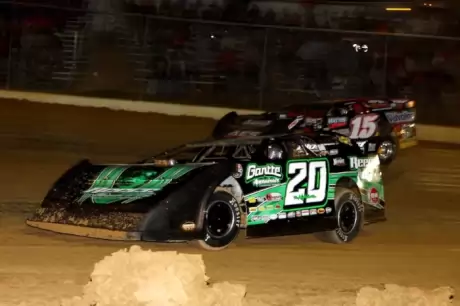 Jimmy Owens (20) repels a rare challenge from Steve Francis (15) at the Jackson 100. (Roy D. Walker)