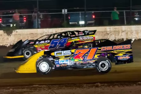 Winner Chris Wall (71) battles David Breazeale (54) at Jackson. (sidelineshutterburg.com)