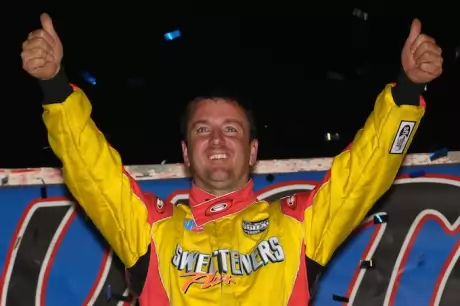 Tim McCreadie celebrates in victory lane. (chrisburback.com)