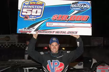 Jeep Van Wormer shows off his big paycheck. (Jim DenHamer)