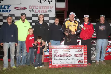 Chad Simpson enjoys victory lane at Farley. (Dan Busch)