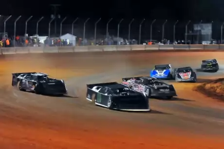 Steven Roberts (111) leds a pack through the corners. (Carolyn Johnson)