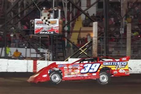 Tim McCreadie takes the checkers at Fairbury. (Jim DenHamer)