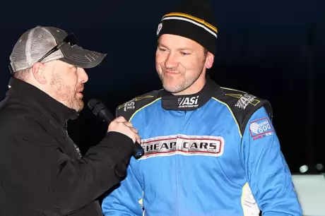 Mike Norris interviews Iowa driver Brian Birkhofer. (mikerueferphotos.photoreflect.com)