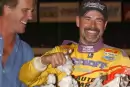 Billy Moyer of Batesville, Ark., celebrates in victory lane with the traditional bolls of cotton after winning the inaugural Cotton Pickin' 100 at Magnolia Motor Speedway in Columbus, Miss., on Oct. 24, 2004. (Brian McLeod)