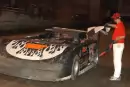 Texan Jon Mitchell grabs the checkered flag after his Comp Cams victory in Memphis in 2003. (DirtonDirt.com)